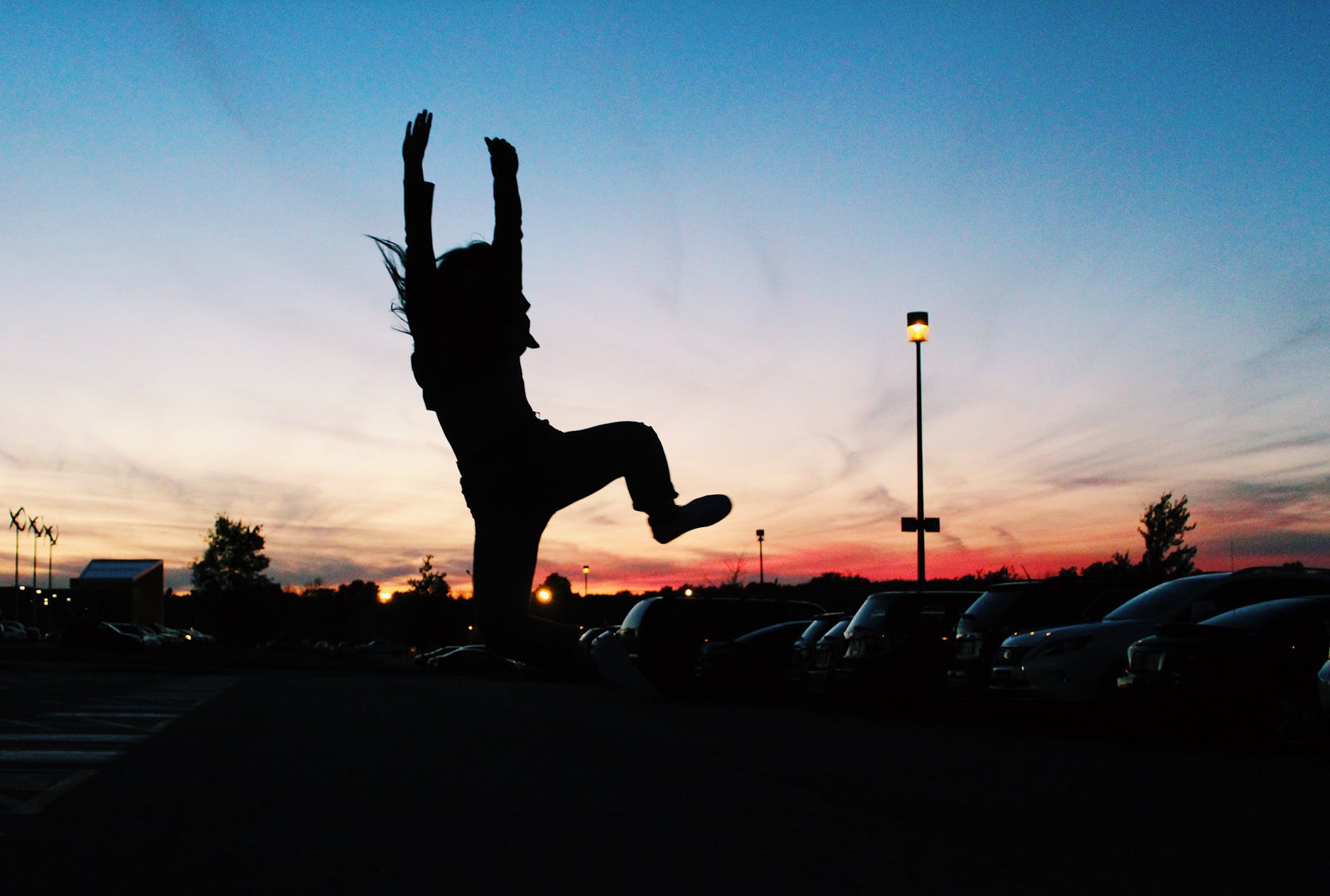 silhouette of jumping person